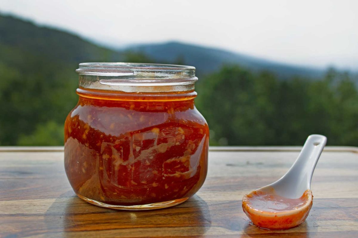 jar of thai sweet chili sauce with spoon