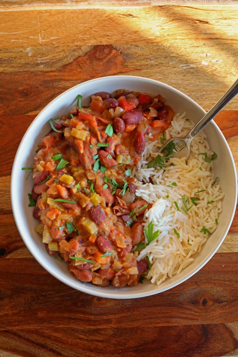 vegetarian red beans and rice in bowl with fork