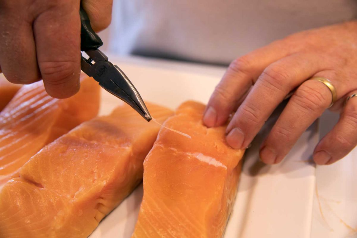 removing pin bones from salmon fillet