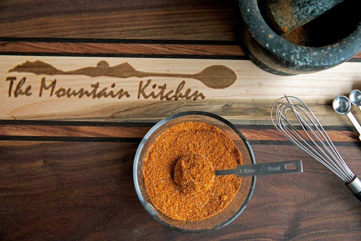 bowl of chicken rub on cutting board