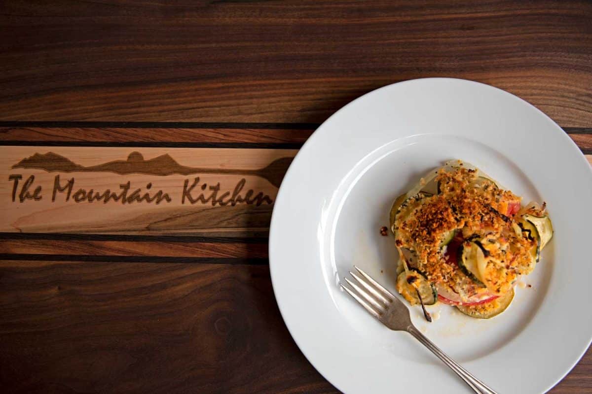plate of casserole on cutting board