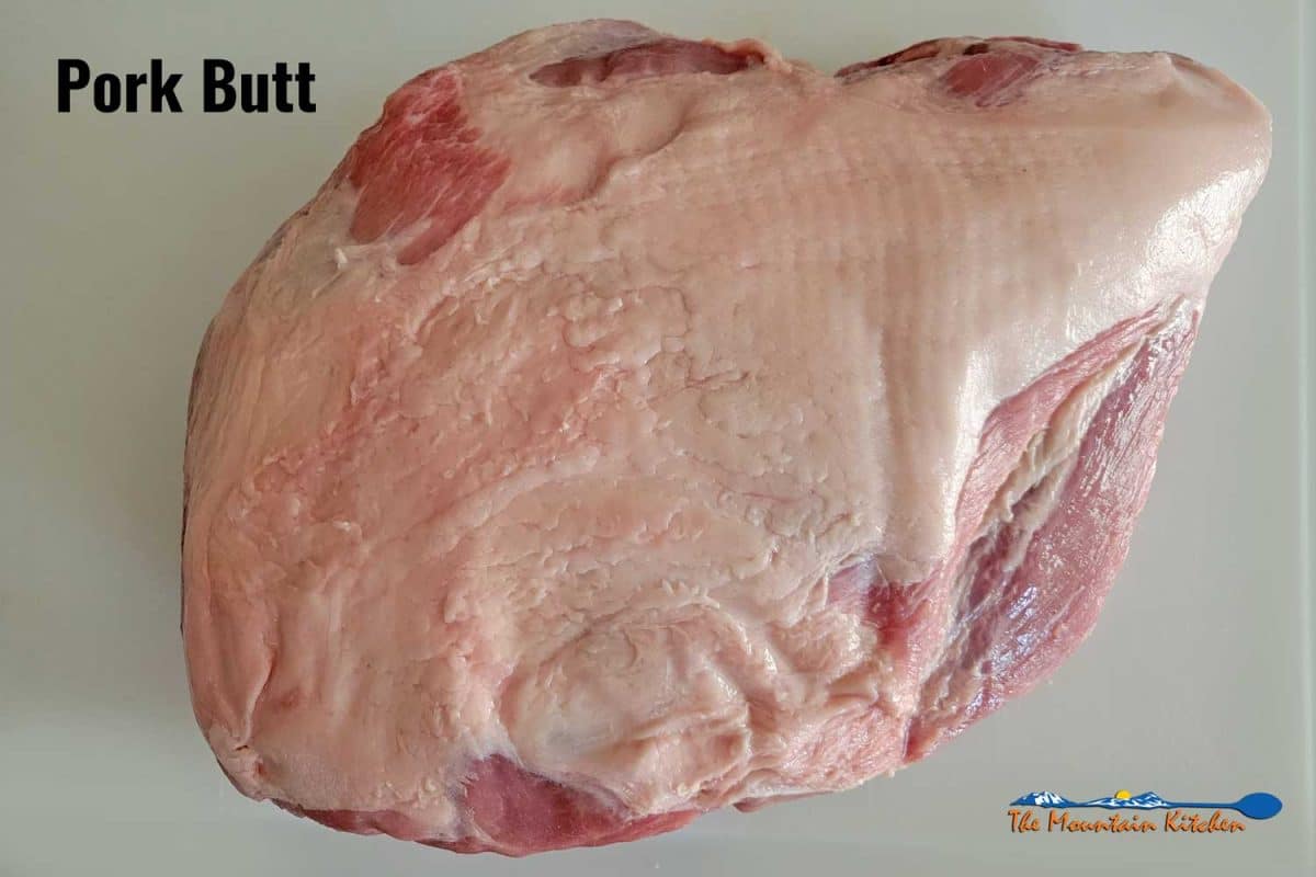 raw pork butt on cutting board