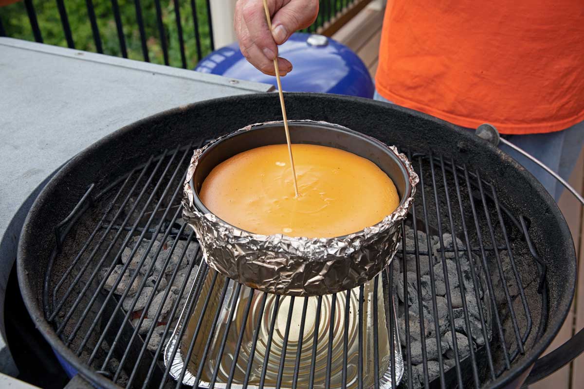 checking cheesecake with a wooden skewer
