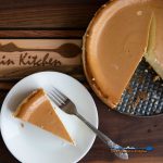 slice of smoked cheesecake on plate with fork