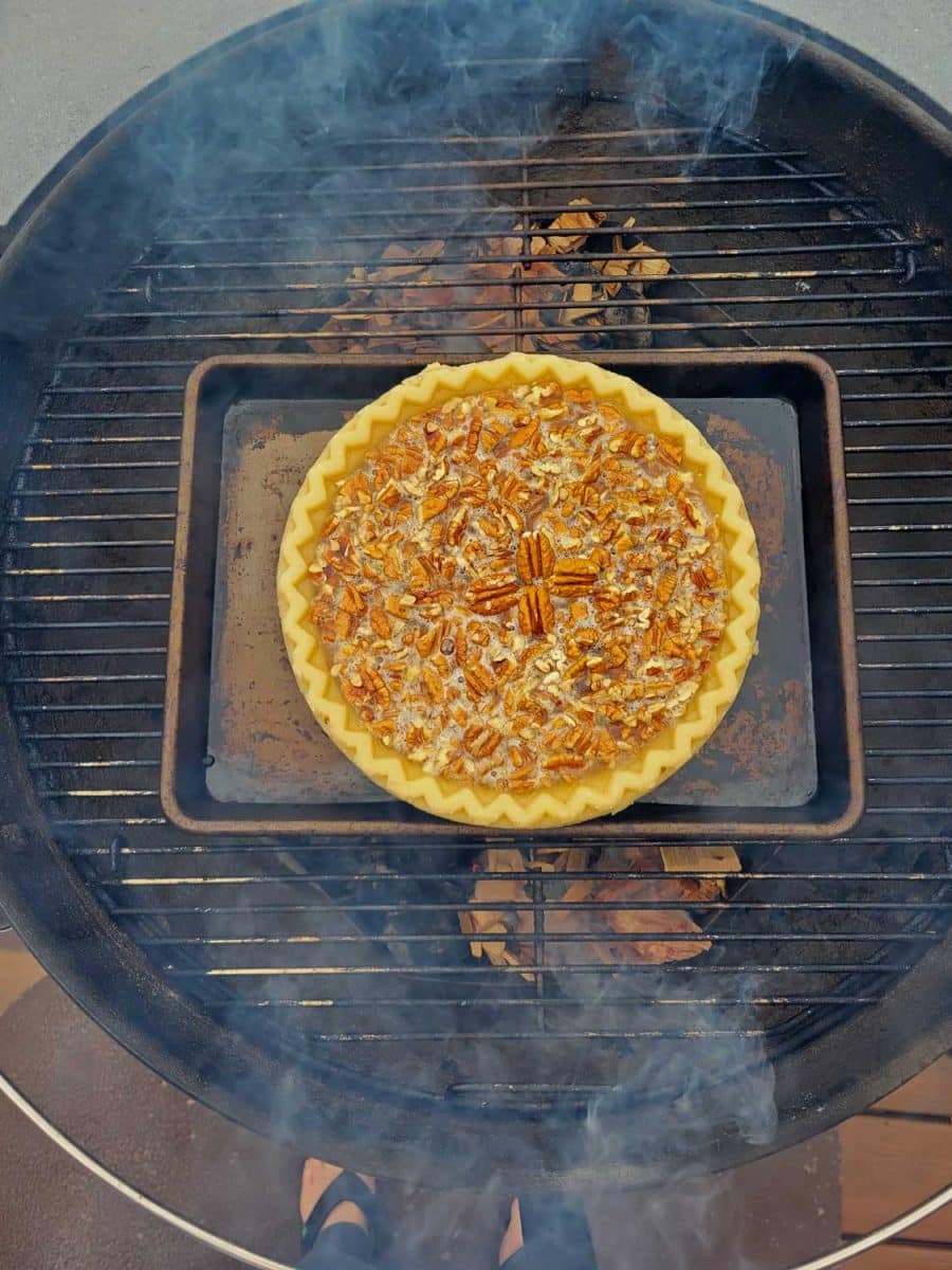 pecan pie smoking on charcoal grill