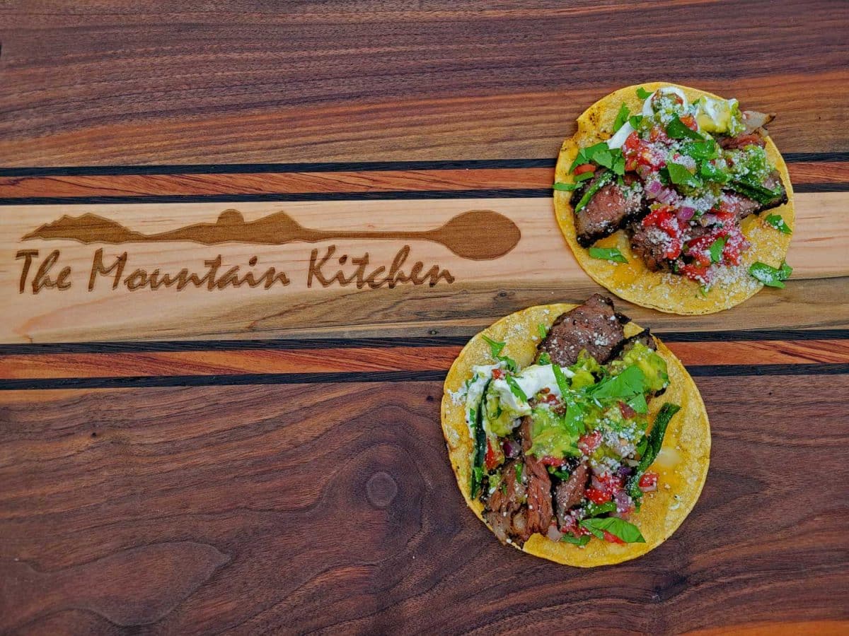 prepared steak tacos on cutting board