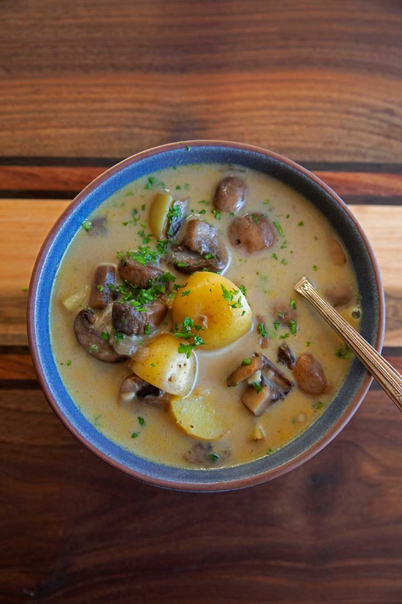 bowl of mushroom potato chowder with spoon