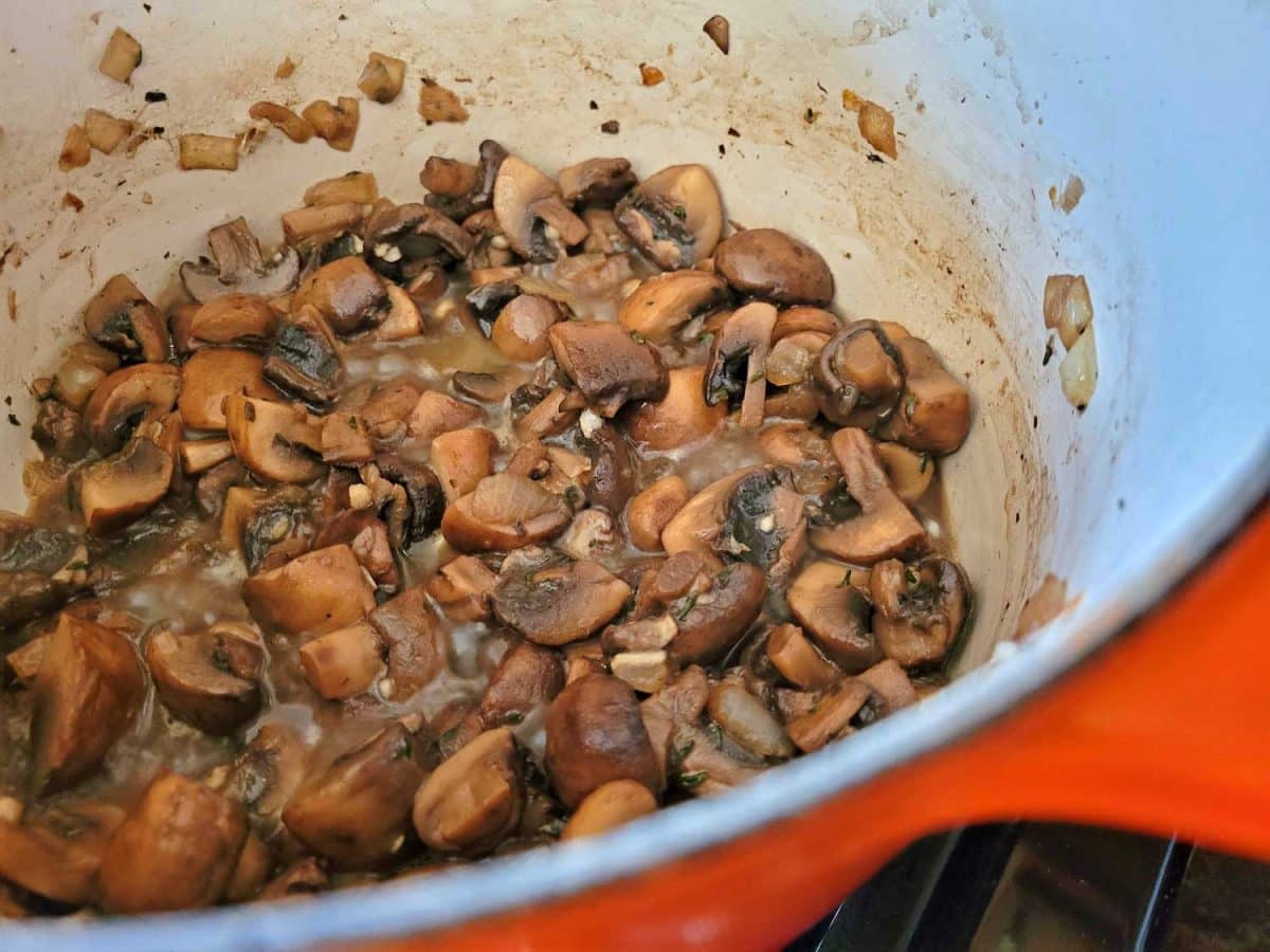 mushrooms cooking in pot