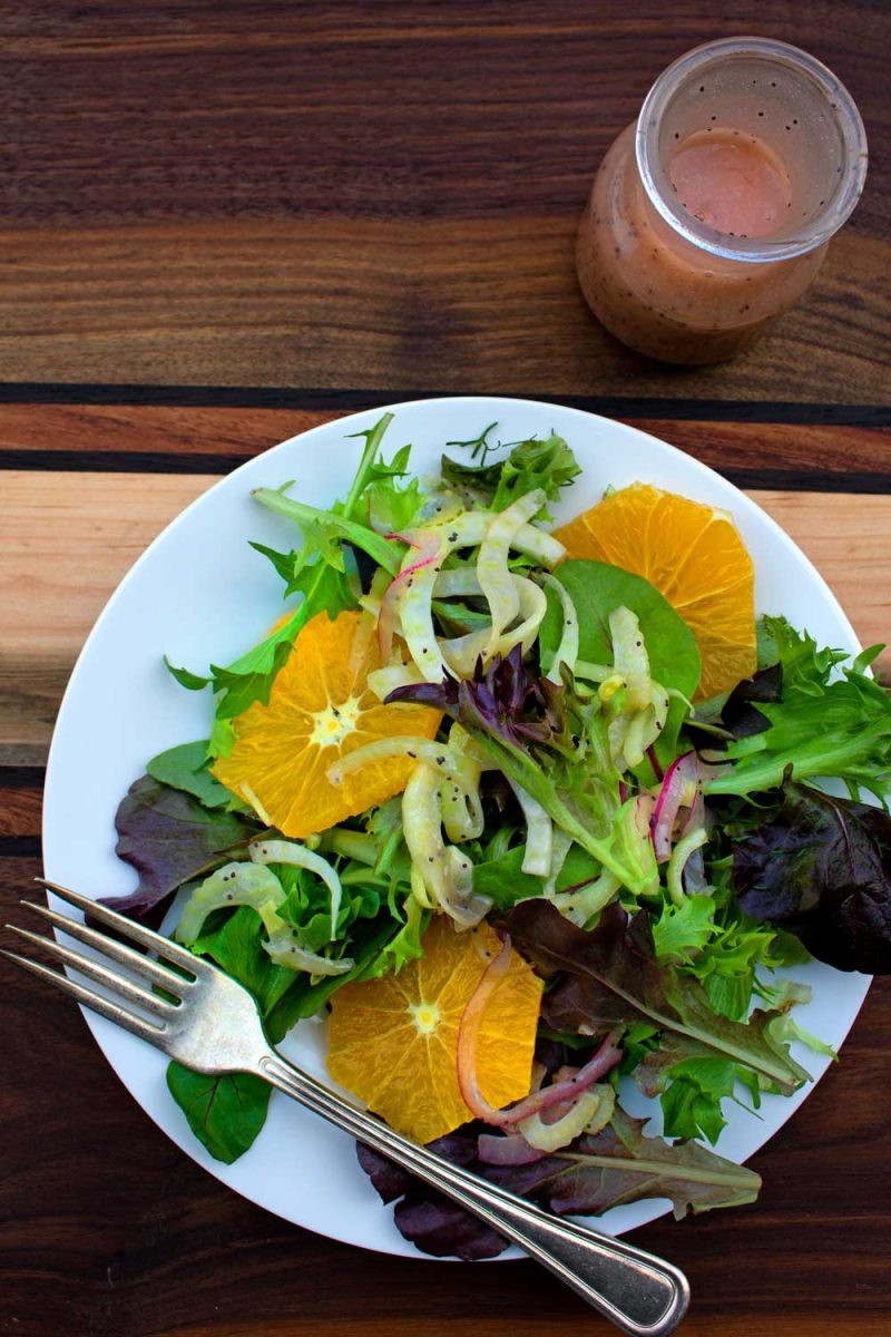 fennel orange salad on plate with fork