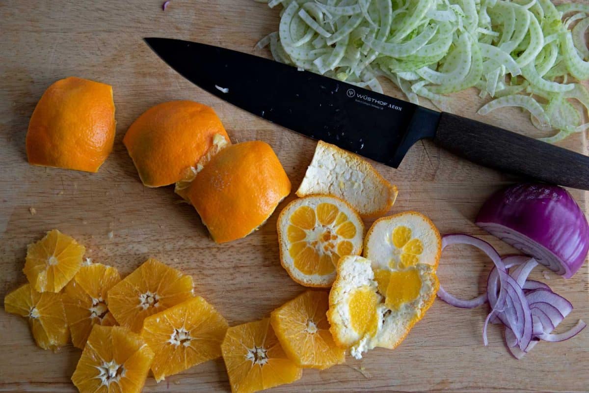 sliced orange on cutting board