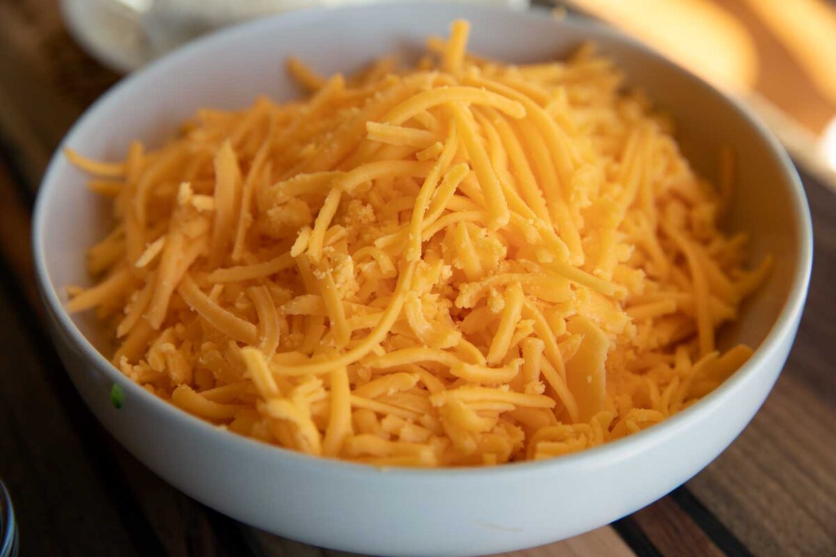 bowl of shredded smoked cheese
