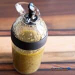 homemade greek salad dressing in shaker bottle