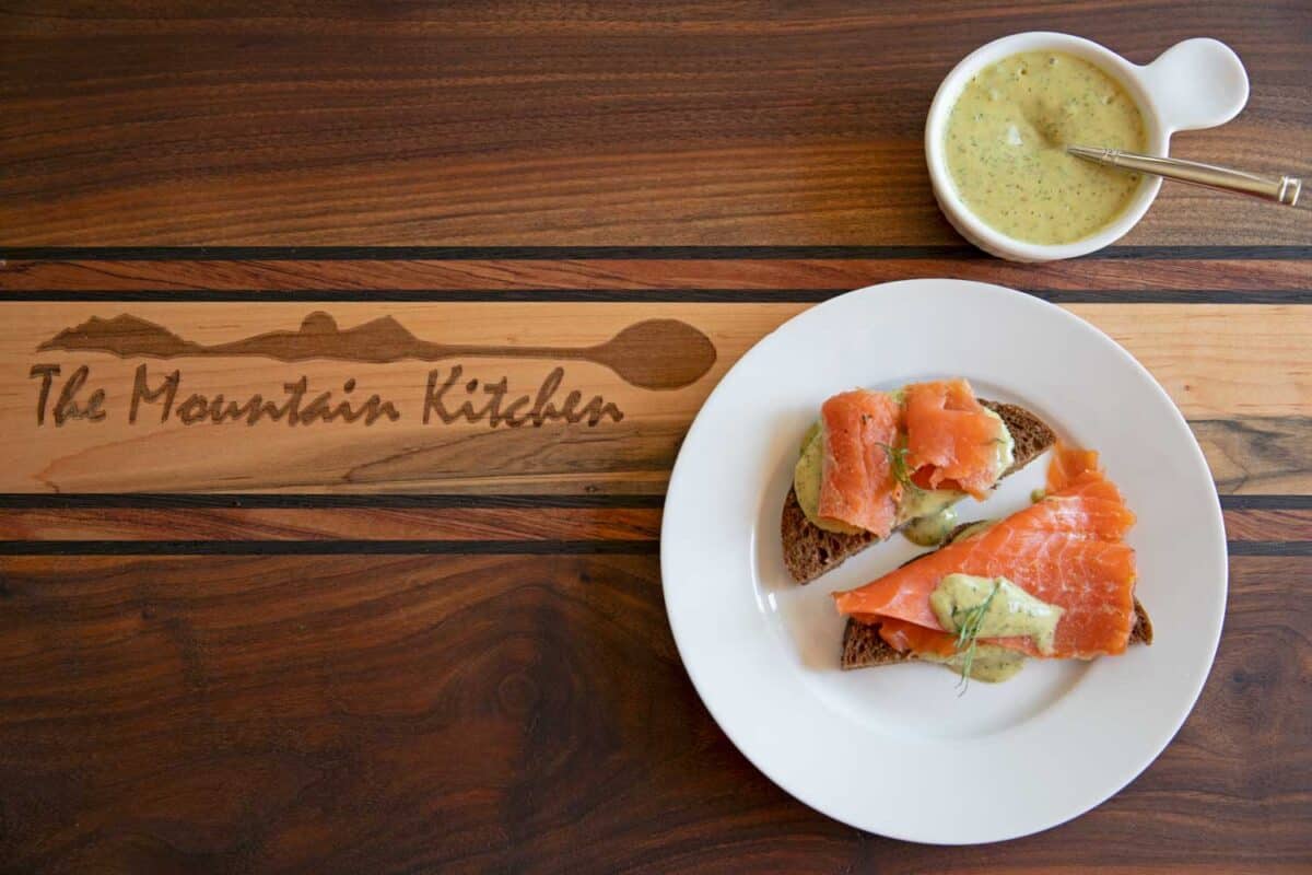 salmon gravlax on plate with gravlax sauce ready to eat
