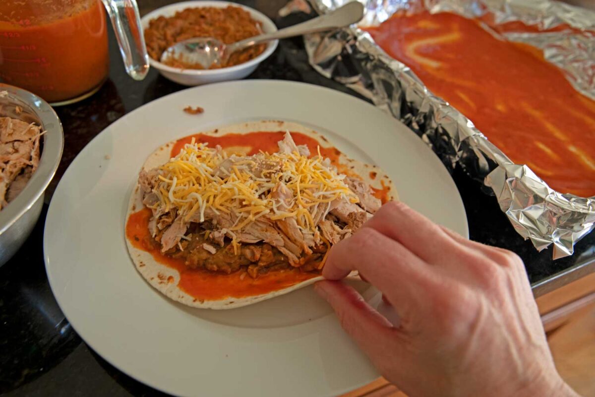 preparing turkey enchiladas