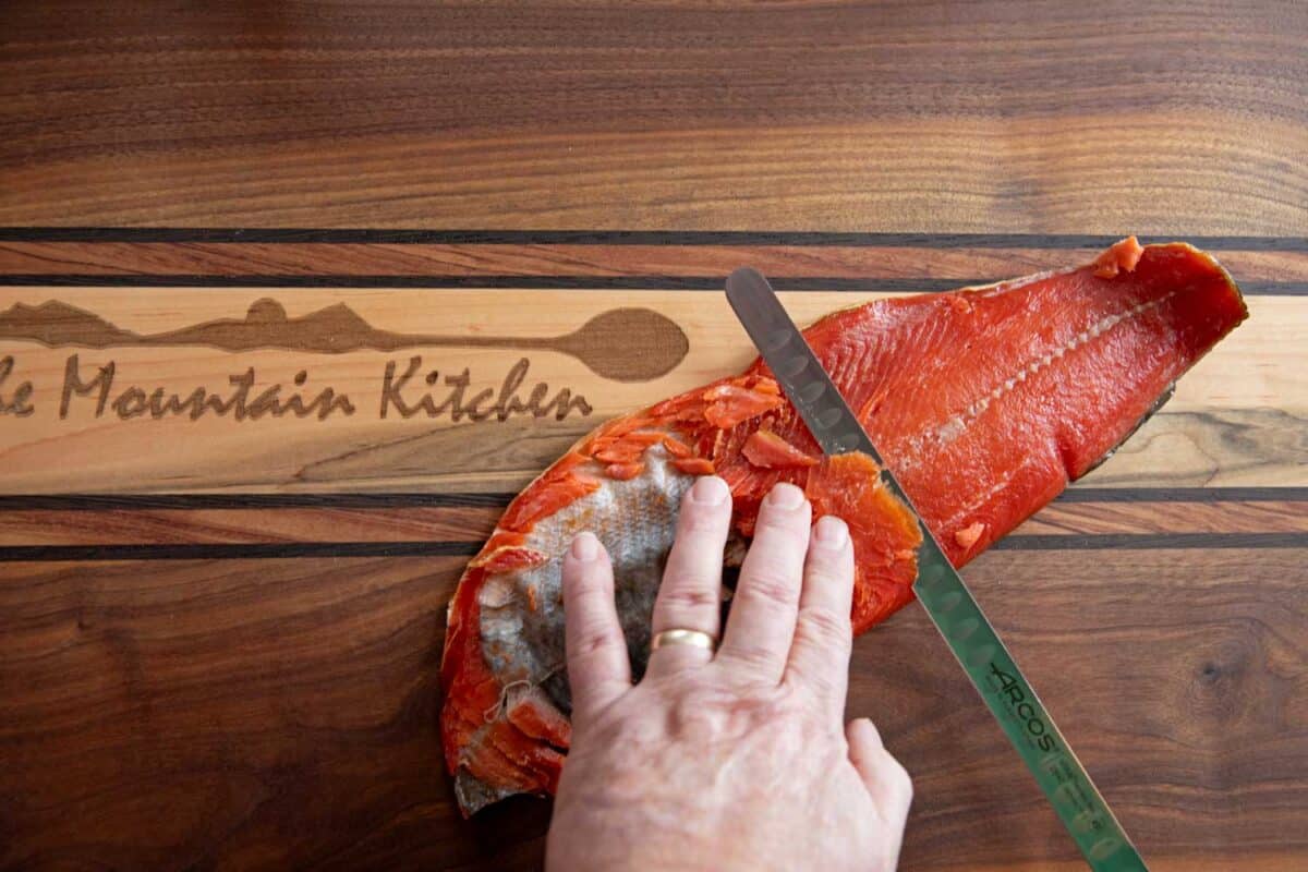 slicing salmon with a salmon knife