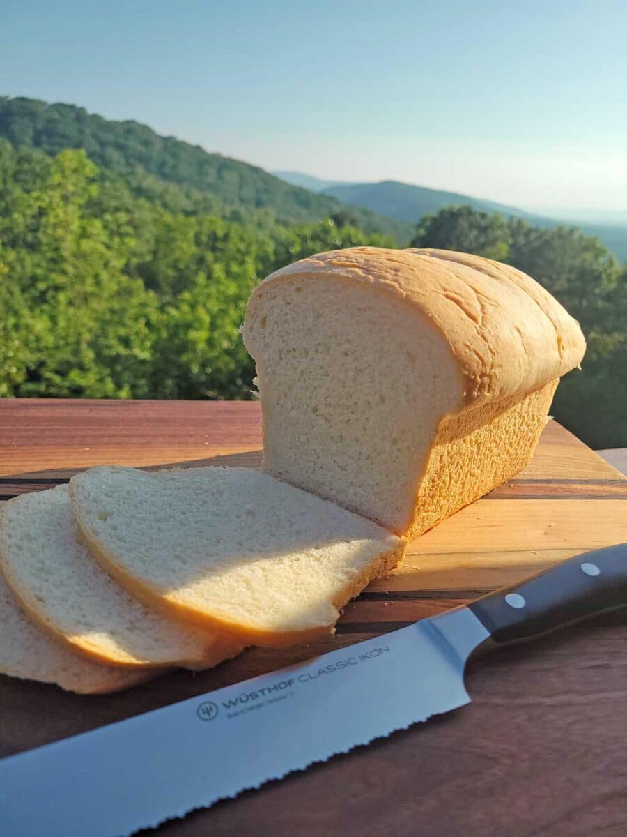 loaf of sliced sandwich bread on cutting board