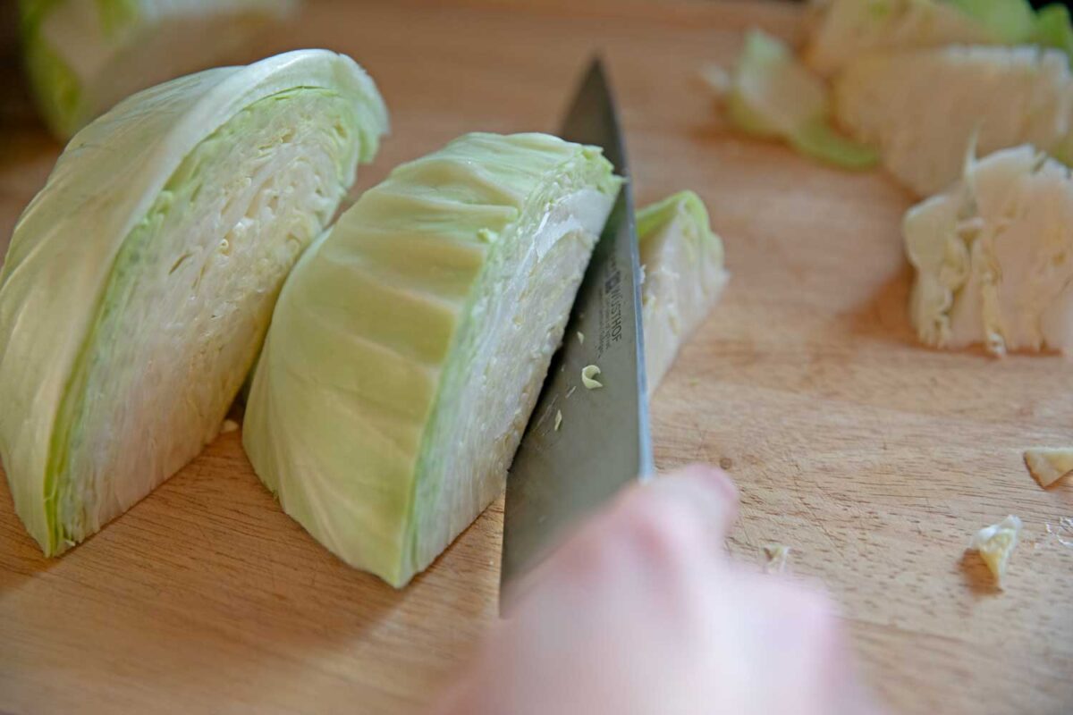 slicing cabbage with knife