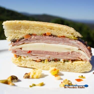 sliced muffuletta sandwich