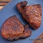 thick-cut air fryer pork chops on serving platter