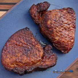 thick-cut air fryer pork chops on serving platter
