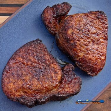 thick-cut air fryer pork chops on serving platter