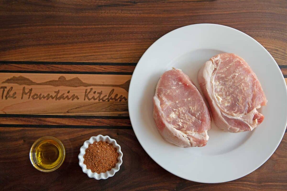 thick-cut pork chops with pork rub and oil
