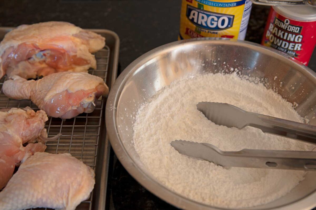 preparing chicken for frying